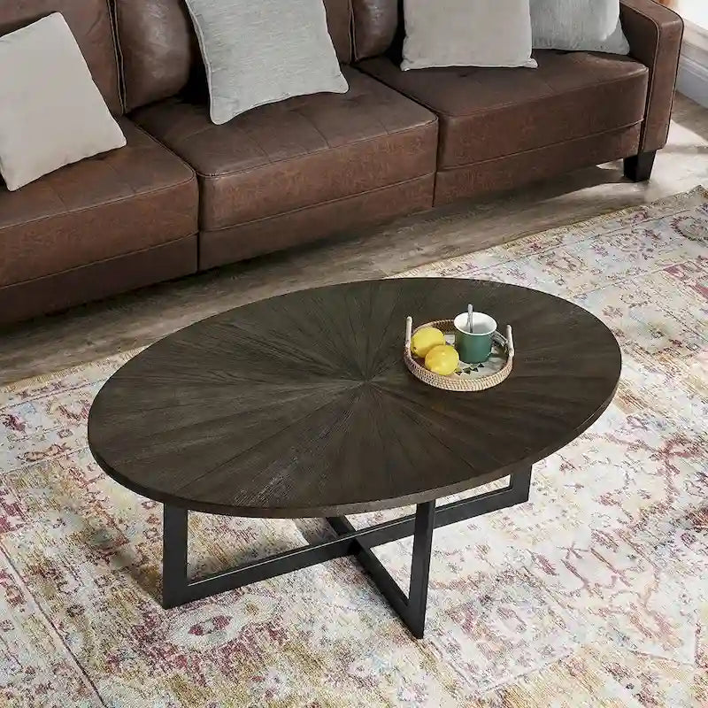 Table basse ovale contemporaine en bois massif avec pieds métalliques croisés
