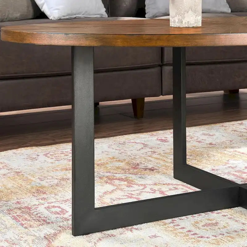 Table basse ovale contemporaine en bois massif avec pieds métalliques croisés
