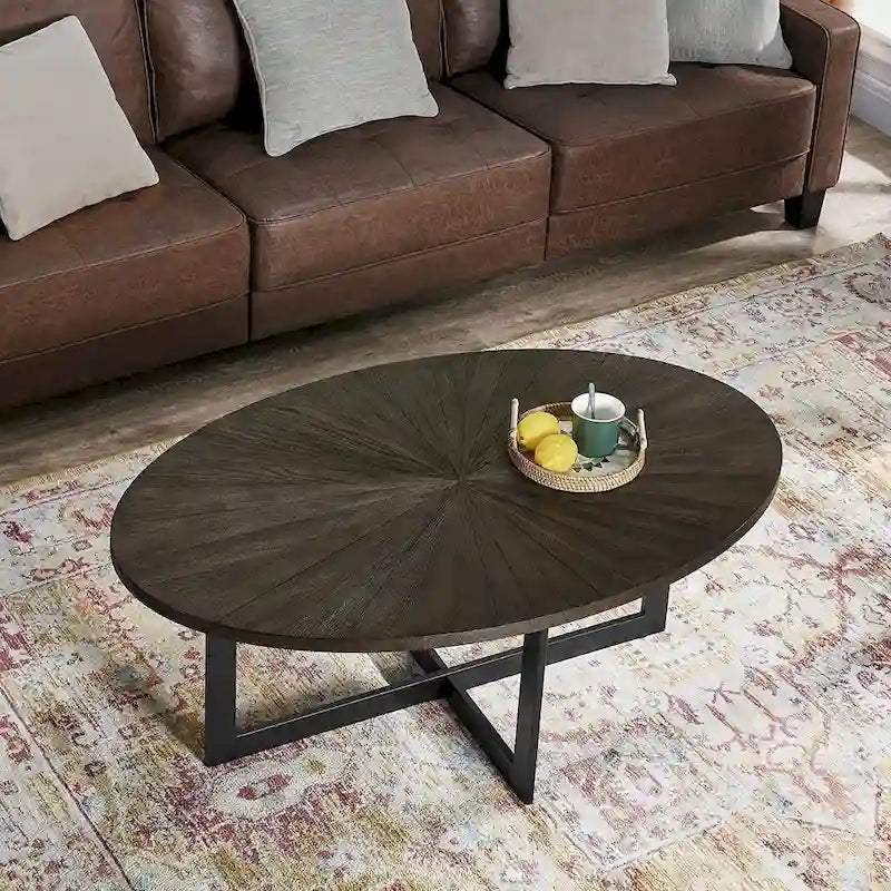 Table basse ovale contemporaine en bois massif avec pieds métalliques croisés